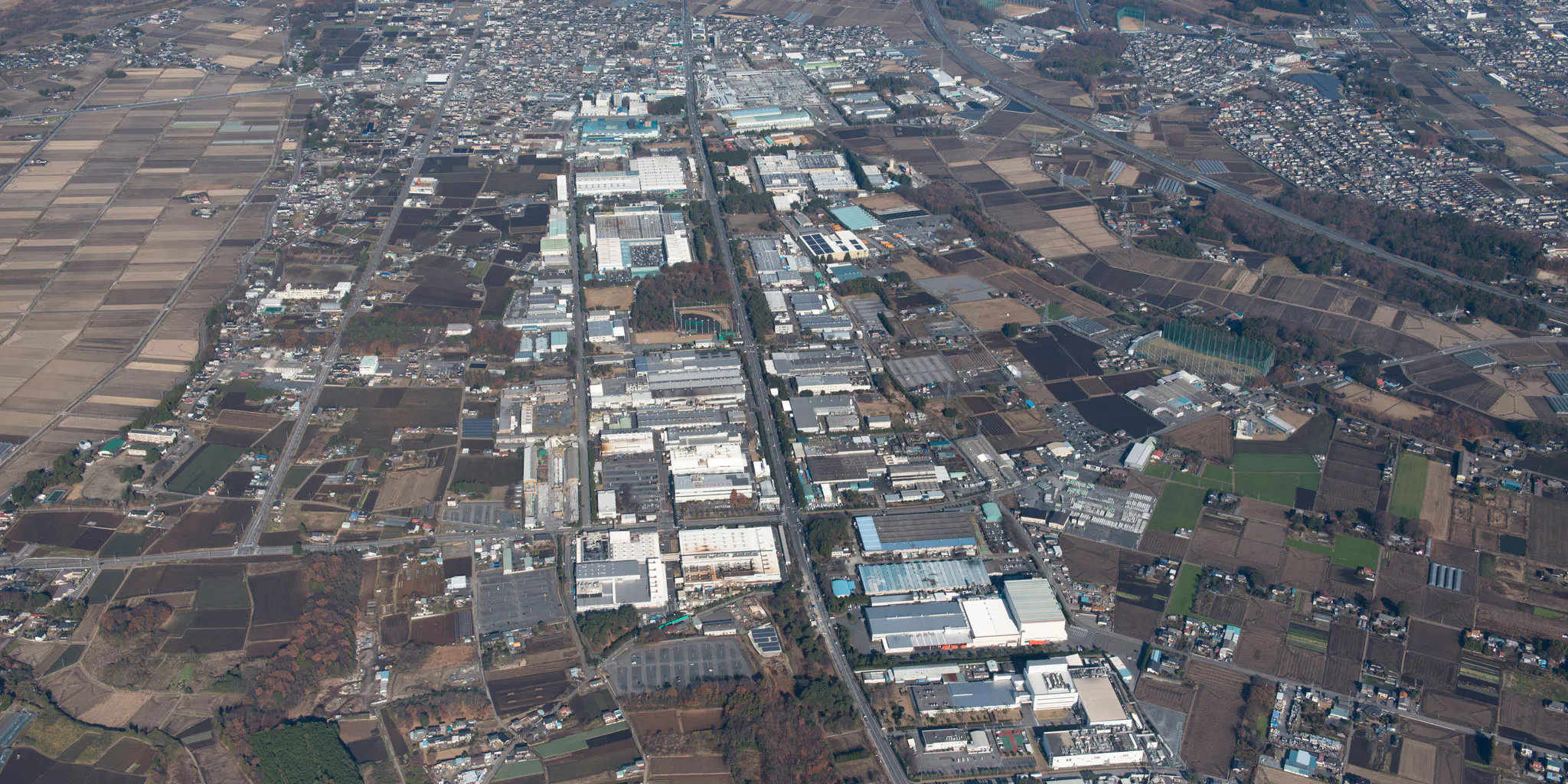 Aerial view of an industrial park surrounded by farmland