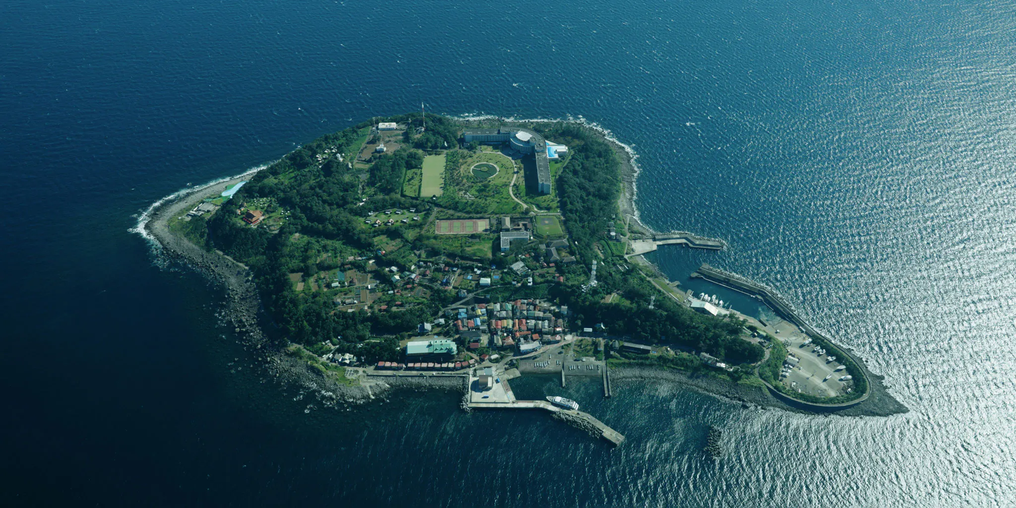 Aerial view of Hatsushima Island's harbor and village area