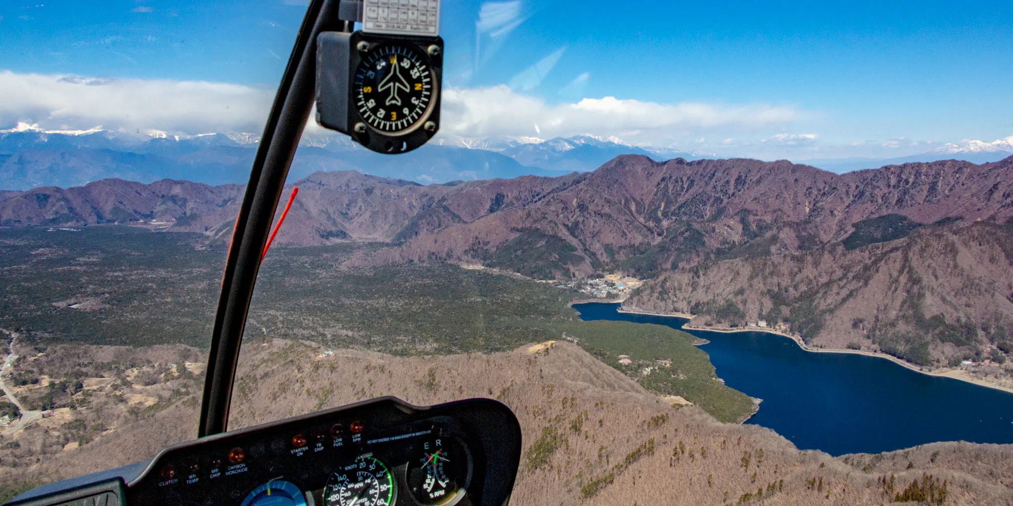 Mountains and lake seen from the cockpit