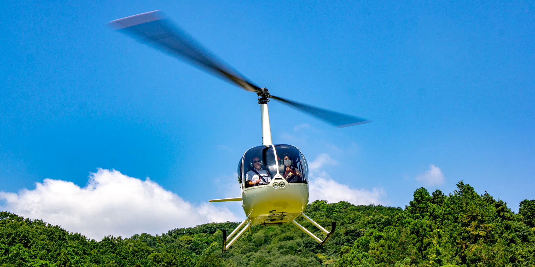 Helicopter in flight with passengers